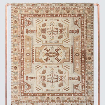 Saraja Hand-Knotted Wool Area Rug with Warm Earth Tones & Traditional Tribal Design