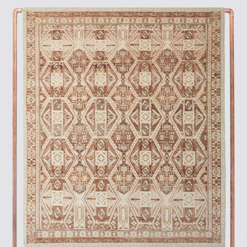 Danvi Hand-Knotted Wool Area Rug with Repeating Tribal Geometry in Soft Earth Tones