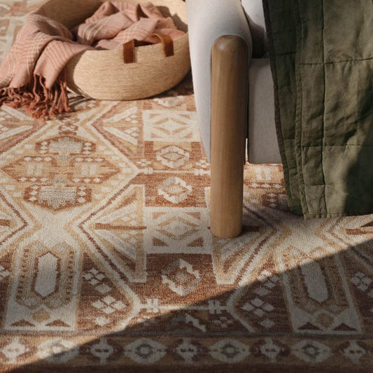 Danvi Hand-Knotted Wool Area Rug with Repeating Tribal Geometry in Soft Earth Tones