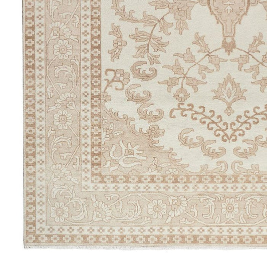 Classic Hand-Knotted Wool Area Rug with Delicate Floral Motifs in Warm Neutral Tones