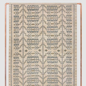 Astrid Hand-Knotted Wool Rug with Repeating Tribal Motifs in Ivory & Blue Tones