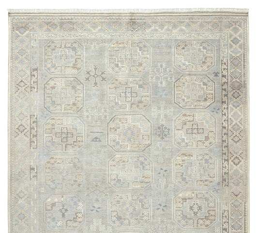 Merrin Hand-Knotted Wool Rug with Soft Geometric Medallions in Pale Blue and Ivory