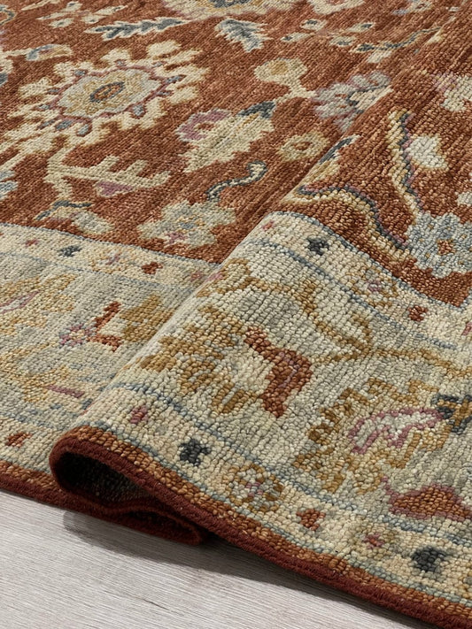 Malayir Hand-Knotted Wool Area Rug in Rust and Neutral Tones