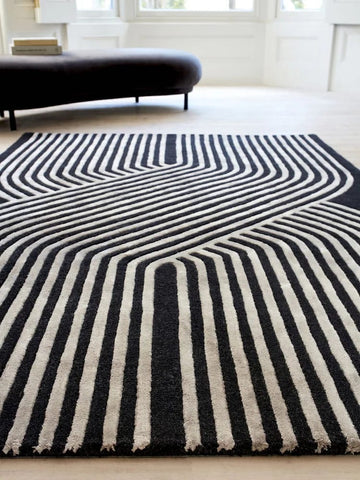 Handmade Modern Wool Area Rug with Abstract Linear Flow Design in Bold Black and Ivory