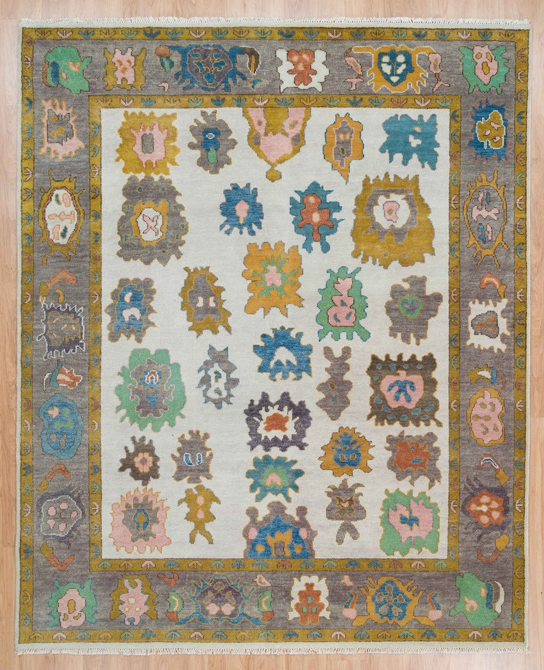 Enchanted Tapestry | Ivory Oushak Rug with Gray Border & Colorful Accents | Wool, Bedroom